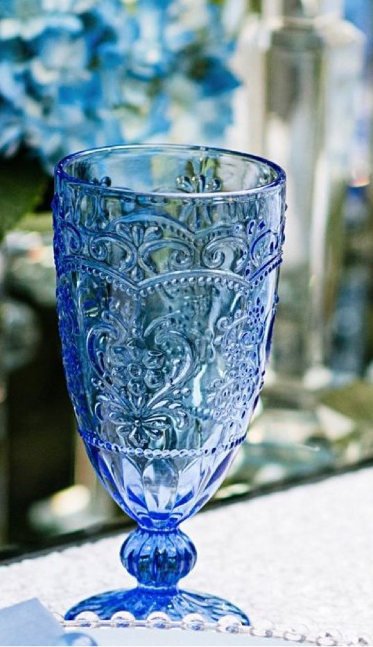 A stock image illustrating blue glass goblet concepts