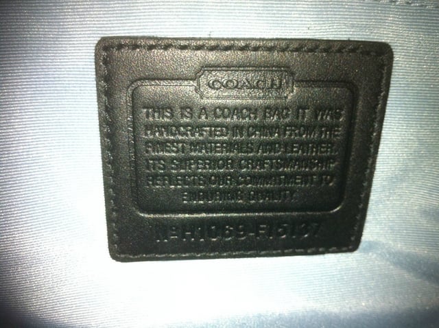 A stock image illustrating coach handbags made in china concepts