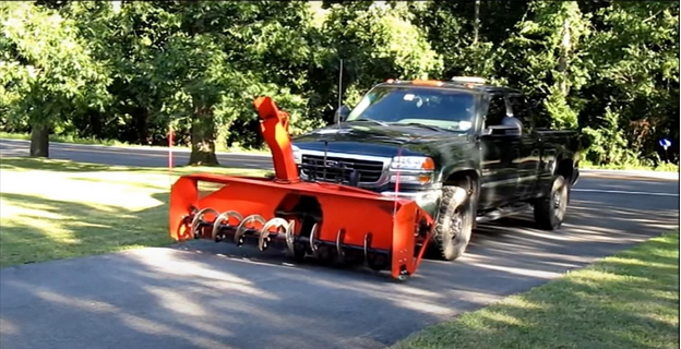 A stock image illustrating truck mounted snow blower concepts