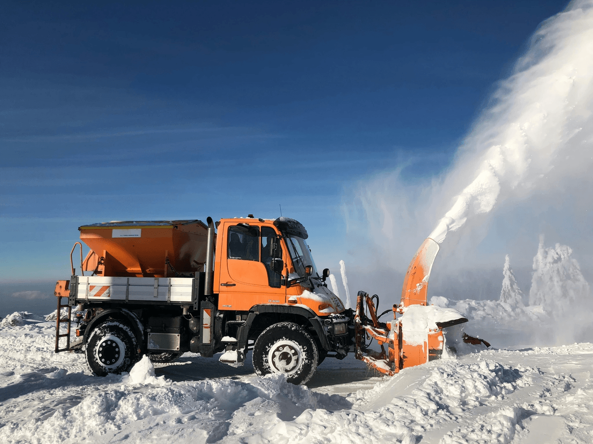 A stock image illustrating truck mounted snow blower concepts