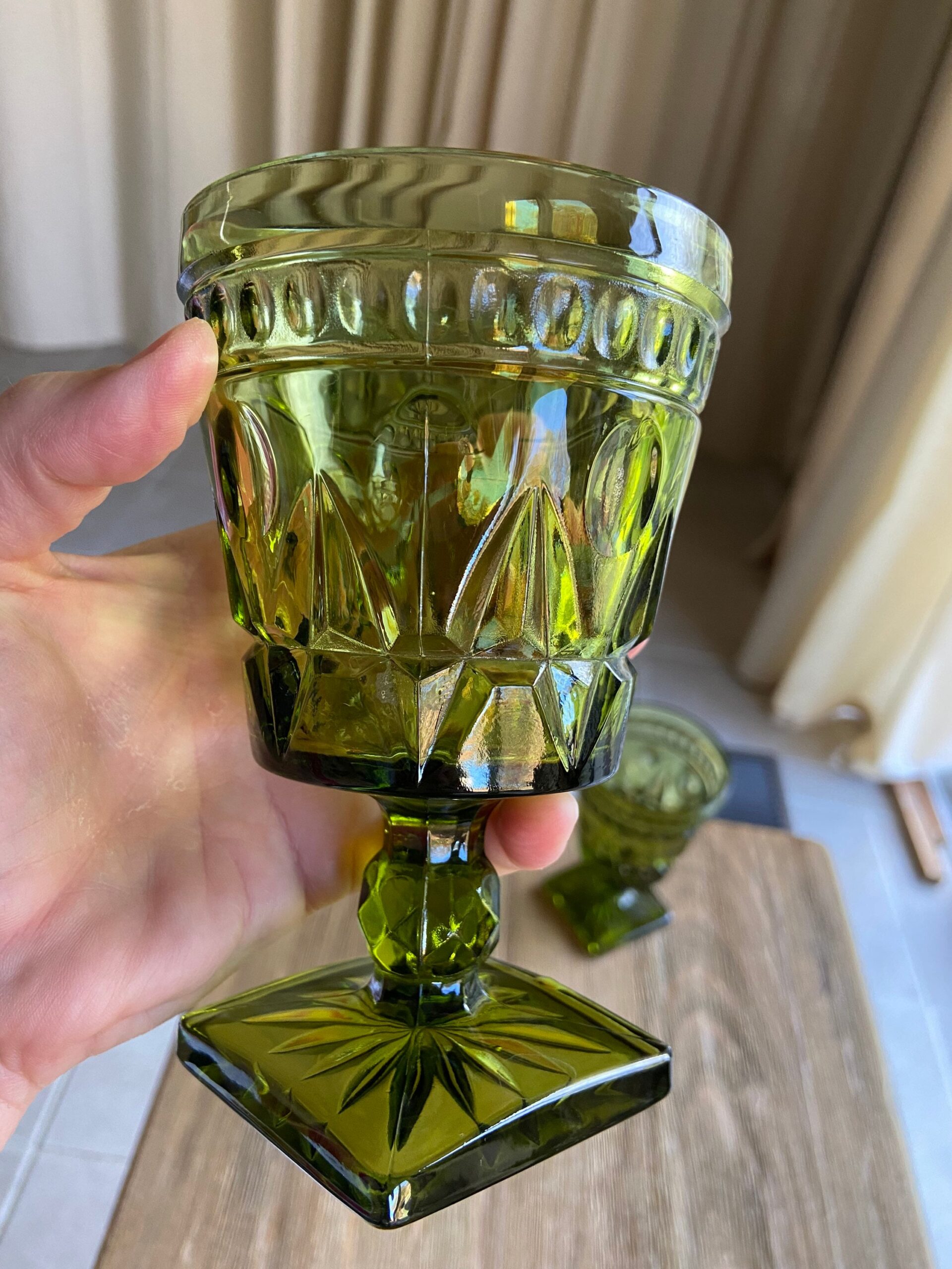 A stock image illustrating vintage green glass goblets concepts